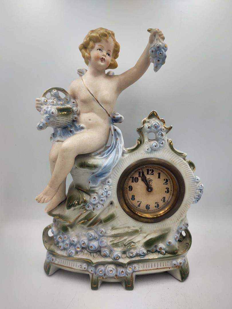 Zegar porcelanowy figuralny