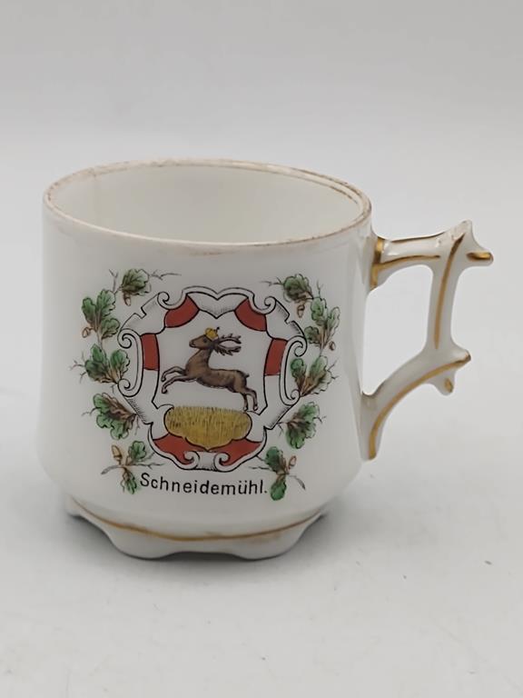 Porcelanowa filiżanka-kubek z herbem Schneidemühl (Piła)