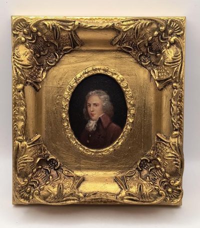 Portret w złotej ramie