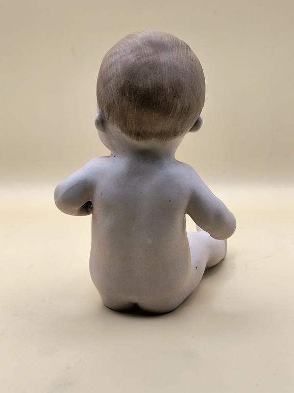 Figurka porcelanowa bobasa - "Piano Baby", Gebrüder Heubach (Bracia Heubach)