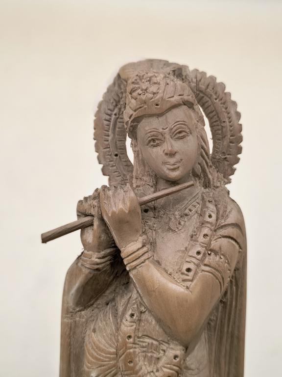 Drewniana figurka hinduskiego bóstwa Kriszny