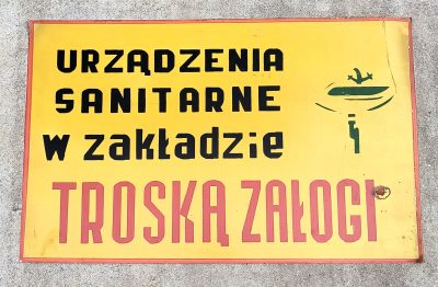 Tablica informacyjna PRL - URZĄDZENIA SANITARNE w zakładzie TROSKĄ ZAŁOGI