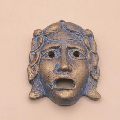 Mosiężna maska teatralna