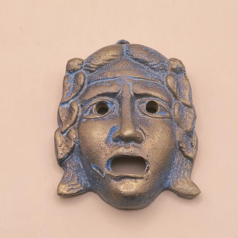Mosiężna maska teatralna